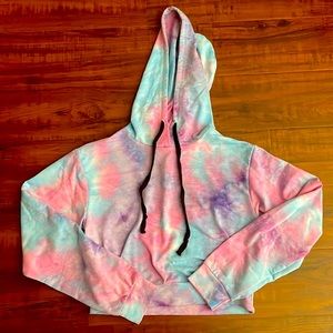 A hoodie/sweater, really pretty colors that include of pink, purple and blue
